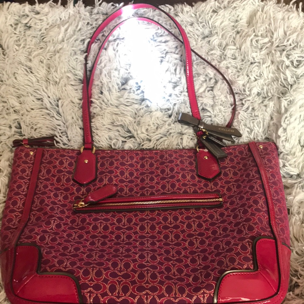 Beautiful Coach bag with kissing C’s used but only a few times